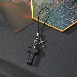Dragonne pour téléphone avec pendentif croix en résine noire scintillante et alliage