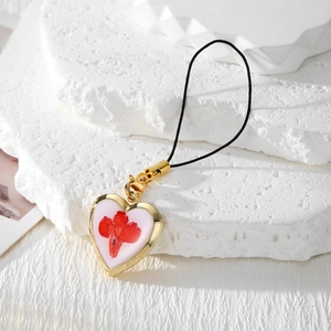 Porte-clés médaillon coeur doré bohème avec fleur séchée rouge et cadre photo