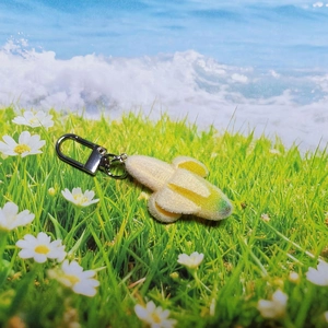 Creative plush banana keychain pendant with soft flocking and silver metal buckle
