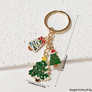 Christmas tree keychain with gold metal ring and three green pendants for bag decor