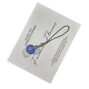 Blue resin blueberry pendant charm with black lanyard and silver metal connector