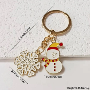 Detailed view of enamel snowman keychain with dimensions and weight measurements