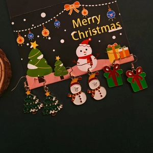 Three-pair Christmas earring set with snowman, tree, and gift box designs for women