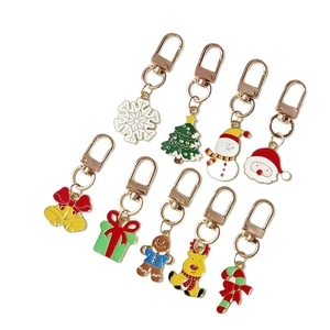 Set di 9 portachiavi natalizi con ciondoli Babbo Natale, pupazzo di neve e fiocchi