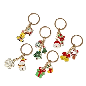 Set of 6 cute Christmas keychains with Santa Claus and reindeer enamel charms