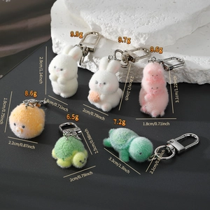 Detailed size and weight chart for various cute flocked animal keychain pendants