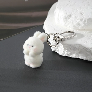 Cute white flocked rabbit keychain with silver metal spring clip for bag accessory