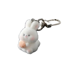 Cute white flocked rabbit keychain with orange pompom and silver metal spring hook
