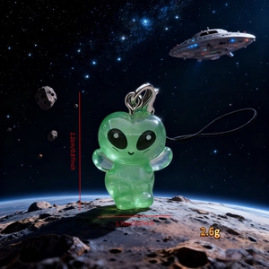 Macro view of green translucent alien pendant with dimensions 2.2cm and silver lobster clasp