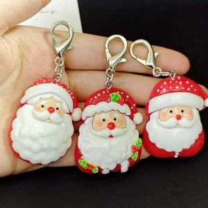 Three-piece set of Santa Claus resin charms with lobster clasps for holiday gifting
