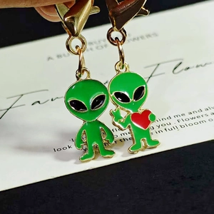 Cartoon green alien charms with lobster clasp and red heart detail for bags