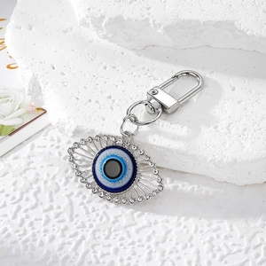 Turkish Evil Eye keychain with blue crystal star charm and rhinestones in silver finish