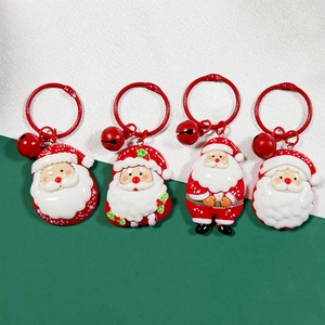 Set of four Santa Claus keychains with red bells and rings for Christmas gifts