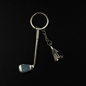 Porte-clés en métal argenté avec pendentifs club de golf et volant de badminton