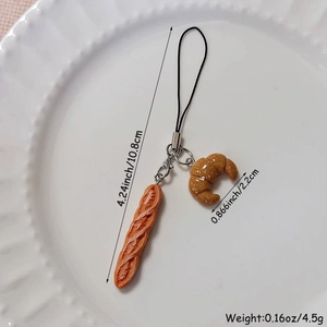Dettaglio dei portachiavi mini croissant e baguette con indicazione delle misure