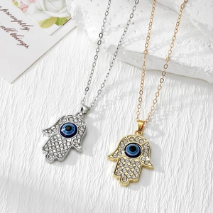 Hamsa Hand en Evil Eye hanger kettingen in goud en zilver afwerking met kristallen inlay