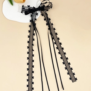 Ballet-style black lace bow hair clip with heart embroidery and long elegant ribbons