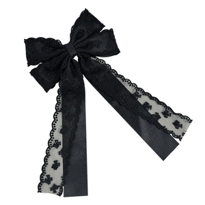 Barrette à cheveux élégante avec nœud en dentelle noire et rubans en satin soyeux