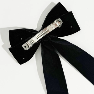 Elegant black velvet bow hair clip with long ribbons and premium metal spring clip