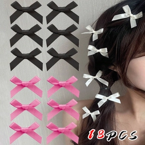18-piece set of satin bow hair clips in black, pink, and white for various hairstyles