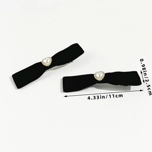 Detail showing measurement of black velvet bow hair clips with heart faux pearl and rhinestones