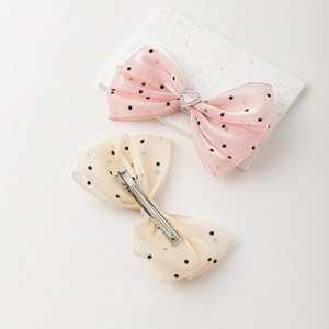 Barrettes à nœud en tulle à pois avec cœur en strass rose et beige poudré