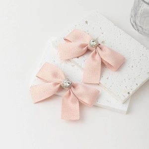 Set di 2 eleganti fermagli per capelli con fiocchi rosa e strass a forma di cuore
