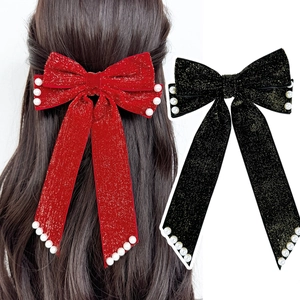 Elegant velvet bow hair clips with pearls in red and black colors for women