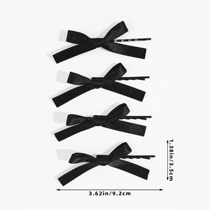 Lot de quatre élégantes pinces à cheveux en satin noir avec clips métalliques