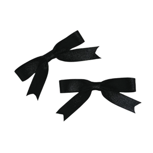 Elegant pair of black satin bow hair clips with a silky finish on a clean white background
