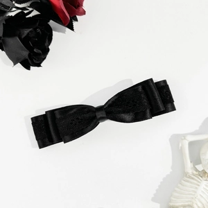 Gothic black satin and lace triple layer bow hair clip styled with dark roses and skull