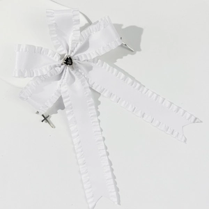 White ruffle bow hair clip with black heart gemstone and silver cross pendants