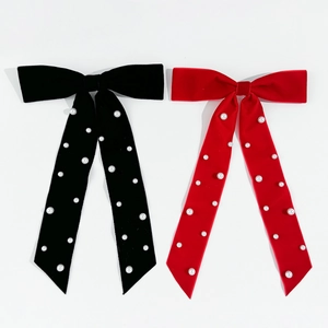 Elegant velvet bow hair clip with pearls and long ribbons in black and red colors