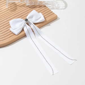 Elegant white satin bow hair clip with black rhinestone heart and long tassel ribbons