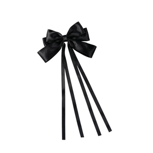 Elegant black satin hair clip with long ribbons and a multi-layered bow design