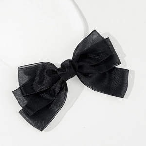 Elegant multi-layer black tulle bow hair clip with a stylish spring clamp design