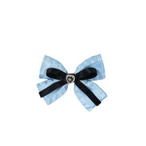 Elegant layered bow hair clip with blue and black satin and heart shaped rhinestone