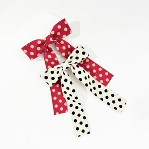Vintage polka dot bow hair clips with long ribbons in red and beige colors for women