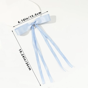 Detail showing 15.5cm width and 26cm length of the light blue gingham ribbon bow clip