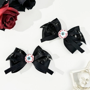 Barrettes d'Halloween gothiques avec ailes de chauve-souris noires et nœuds oculaires
