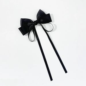 Elegant black satin ribbon hair bow clip with long streamers for women's hairstyles
