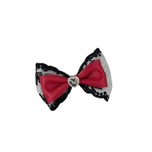 Gothic lace bow hair clip with a dark red satin layer and heart gemstone center