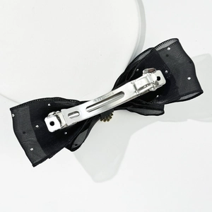 Three-layer black mesh bow hair clip with sparkling rhinestones and metal spring clip
