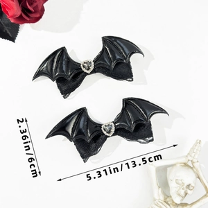 Detailed view of Gothic bat wing hair clips with dimensions 2.36 x 5.31 inches