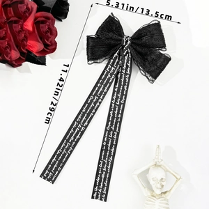 Gothic style black lace bow hair clip with long lettered ribbons and 11.42 inch length