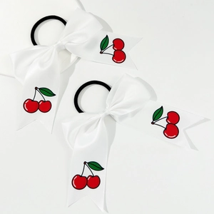Two-piece set of white satin bow hair ties with cute red cherry print on white background