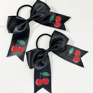 Pair of black satin bow hair ties with sweet cherry prints on long ribbon ends