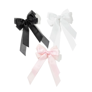 Ensemble de trois barrettes à nœuds en maille élégante en noir, blanc et rose tendre