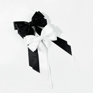 Elegant double-layered satin bow hair clips with long ribbons in black and white set