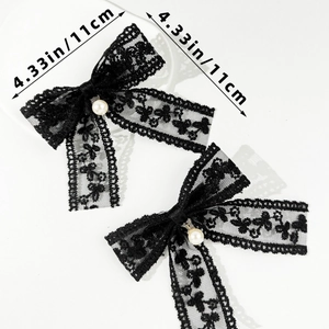 Detailed close-up of black lace bow hair clips with pearls showing 11cm size dimensions